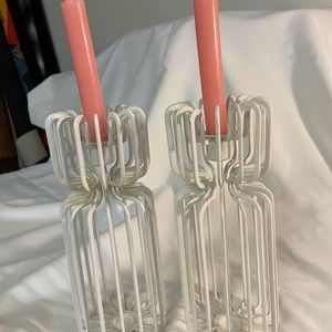 White vinyl coated metal candle holders.